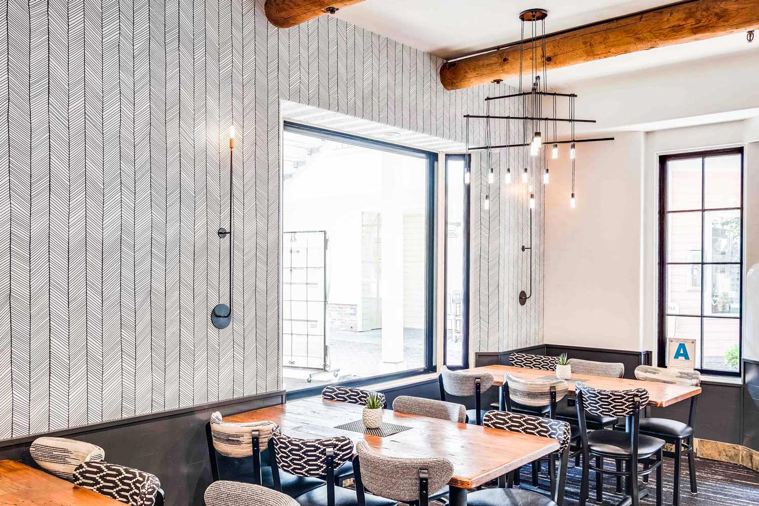 Commercial dining interior with installed wallcovering